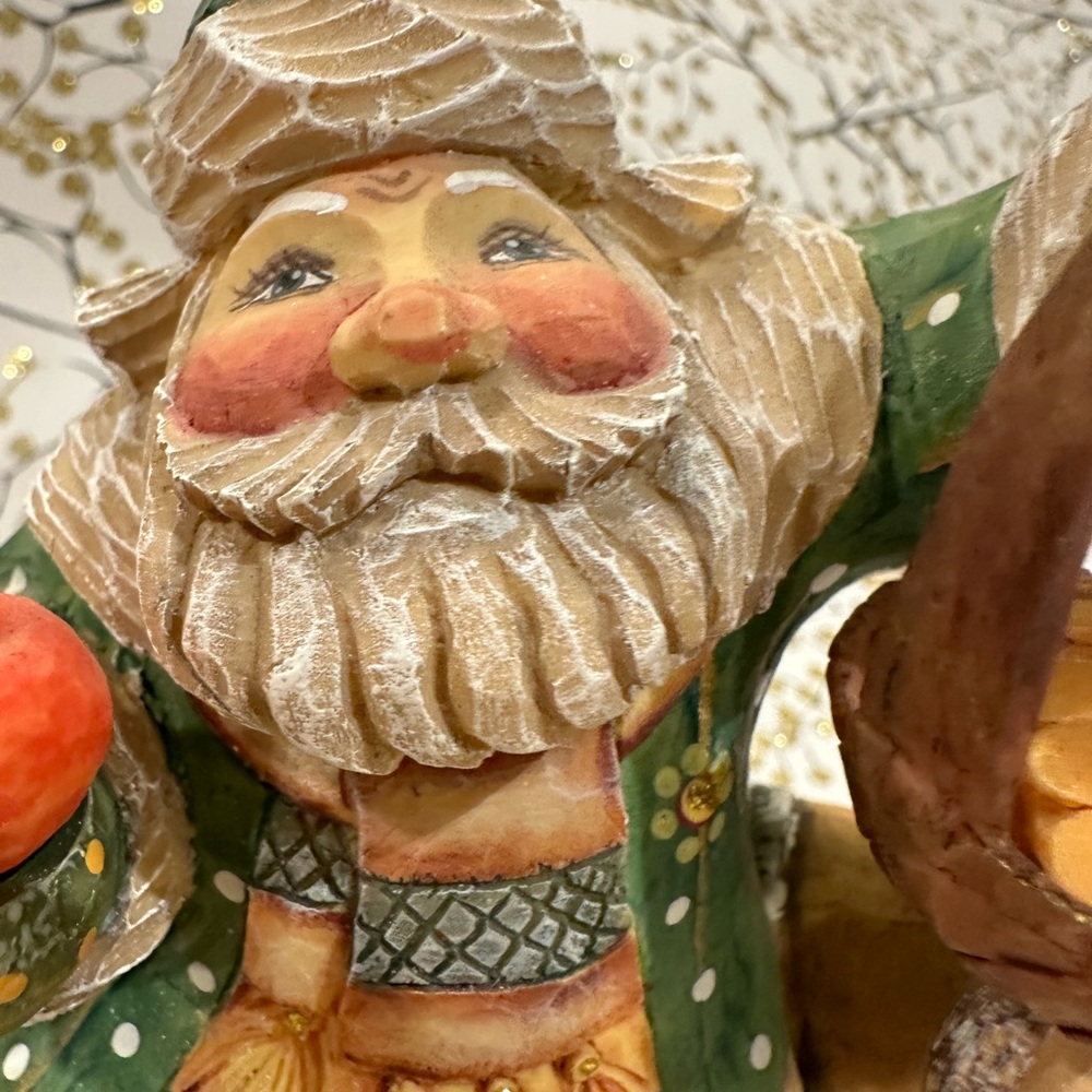 G. DeBrekht Wood carved Santa on Sheep collectible